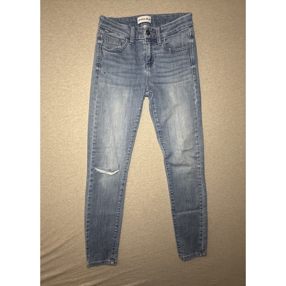 Studio Blue light wash blue jean. size 25. Straight Leg slim fit. distressed